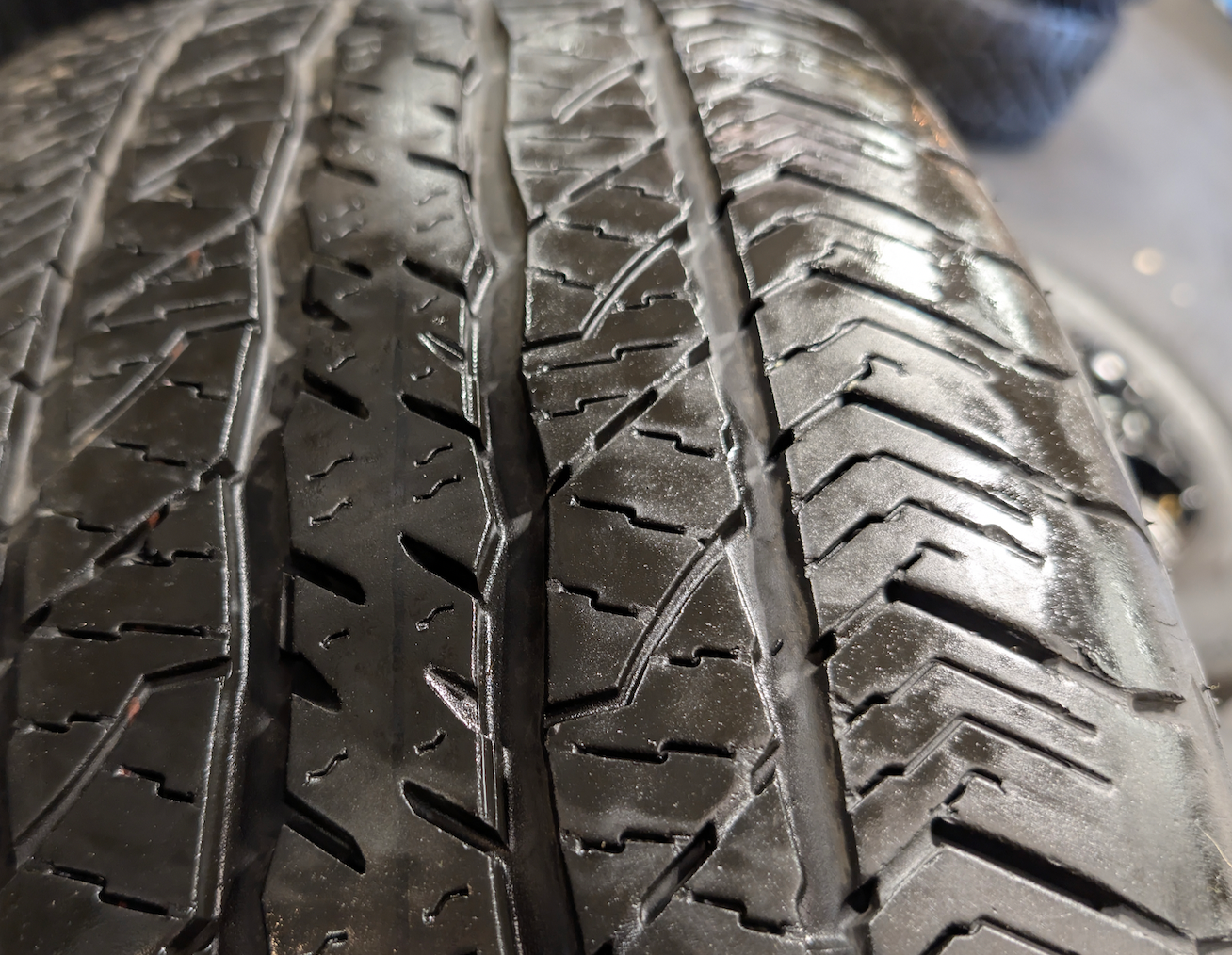 Gloss Black Ford F-150 OEM 20” Wrapped in Hankook Dynapro AT2 275/60R20