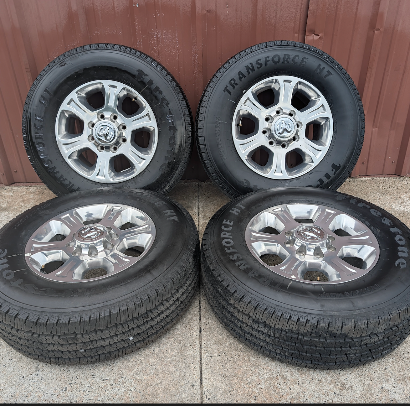 Polished Aluminum Ram 2500 / 3500 OEM 18” Wrapped in Firestone Transforce HT LT275/70R18