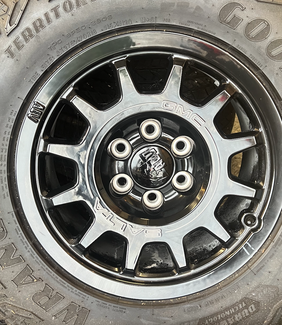 OEM 18” Wheels wrapped in Goodyear Wrangler Territory M/T tires.