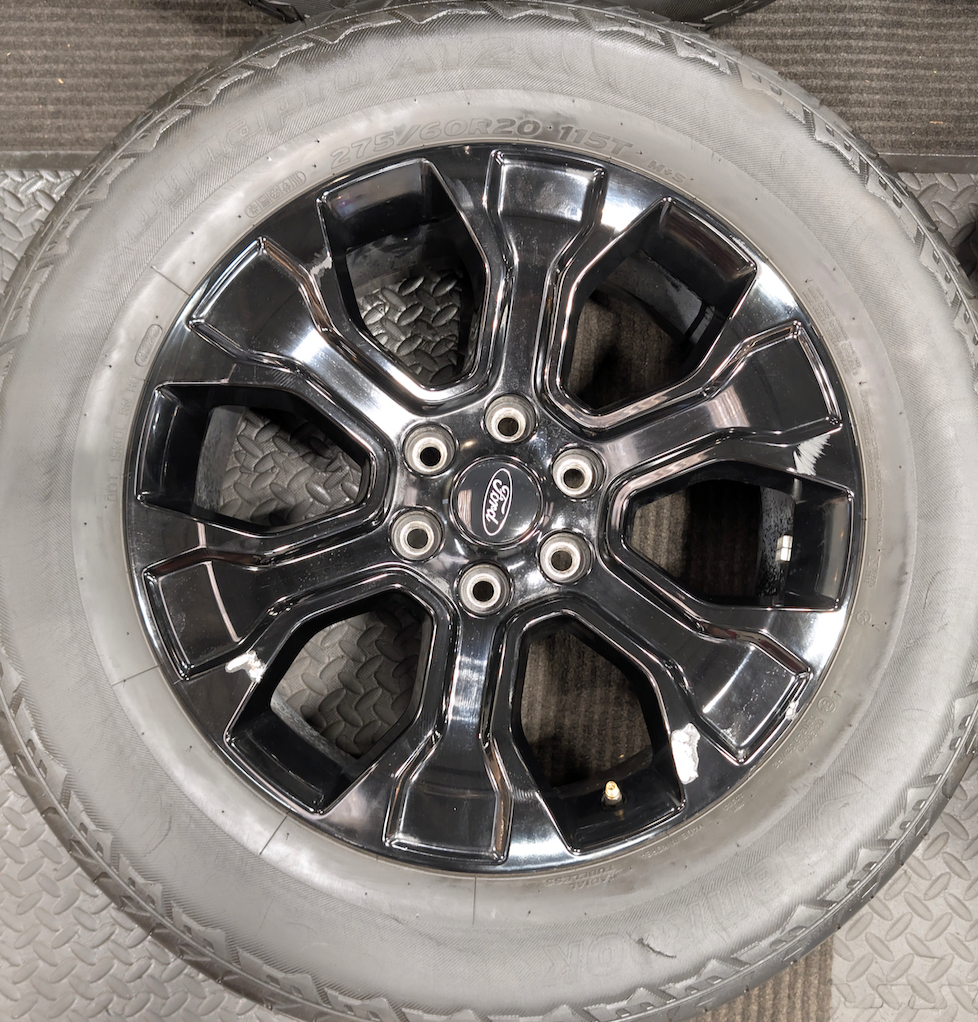 Gloss Black Ford F-150 OEM 20” Wrapped in Hankook Dynapro AT2 275/60R20