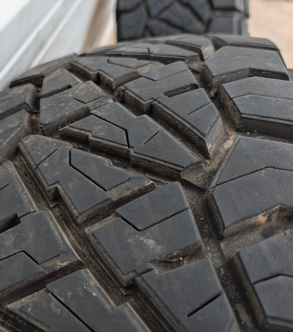 Gloss Black Ford F-250 / F-350 Super Duty OEM 18” Wrapped in Nitto Ridge Grappler LT285/75R18
