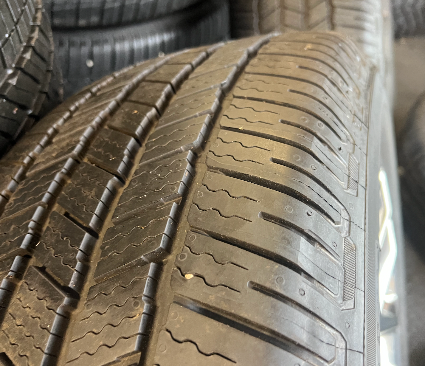 OEM 22” Polished 6-Split-Spoke Wheels wrapped in Bridgestone tires.