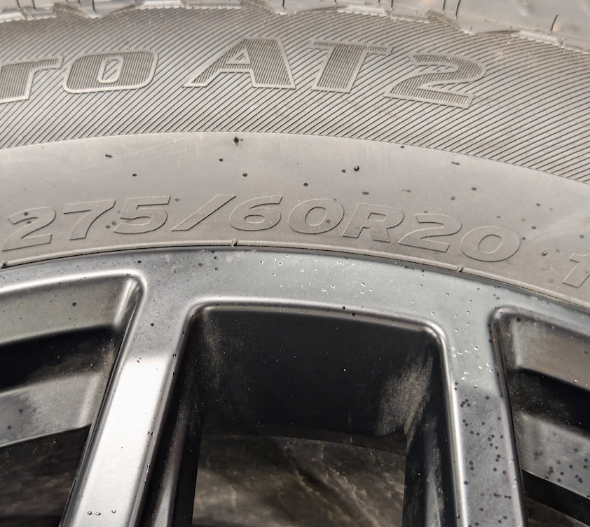 Gloss Black Ford F-150 OEM 20” Wrapped in Hankook Dynapro AT2 275/60R20