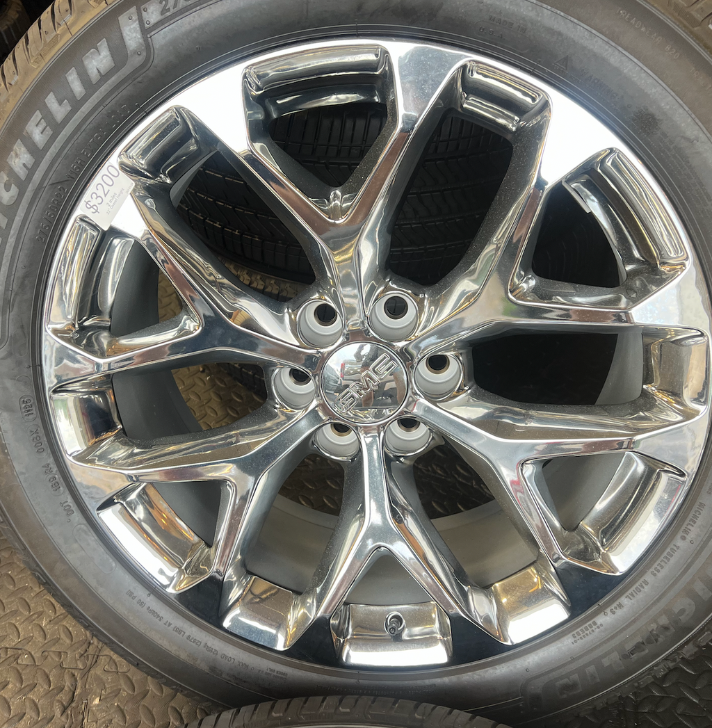 OEM 22” Polished 6-Split-Spoke Wheels wrapped in Bridgestone tires.