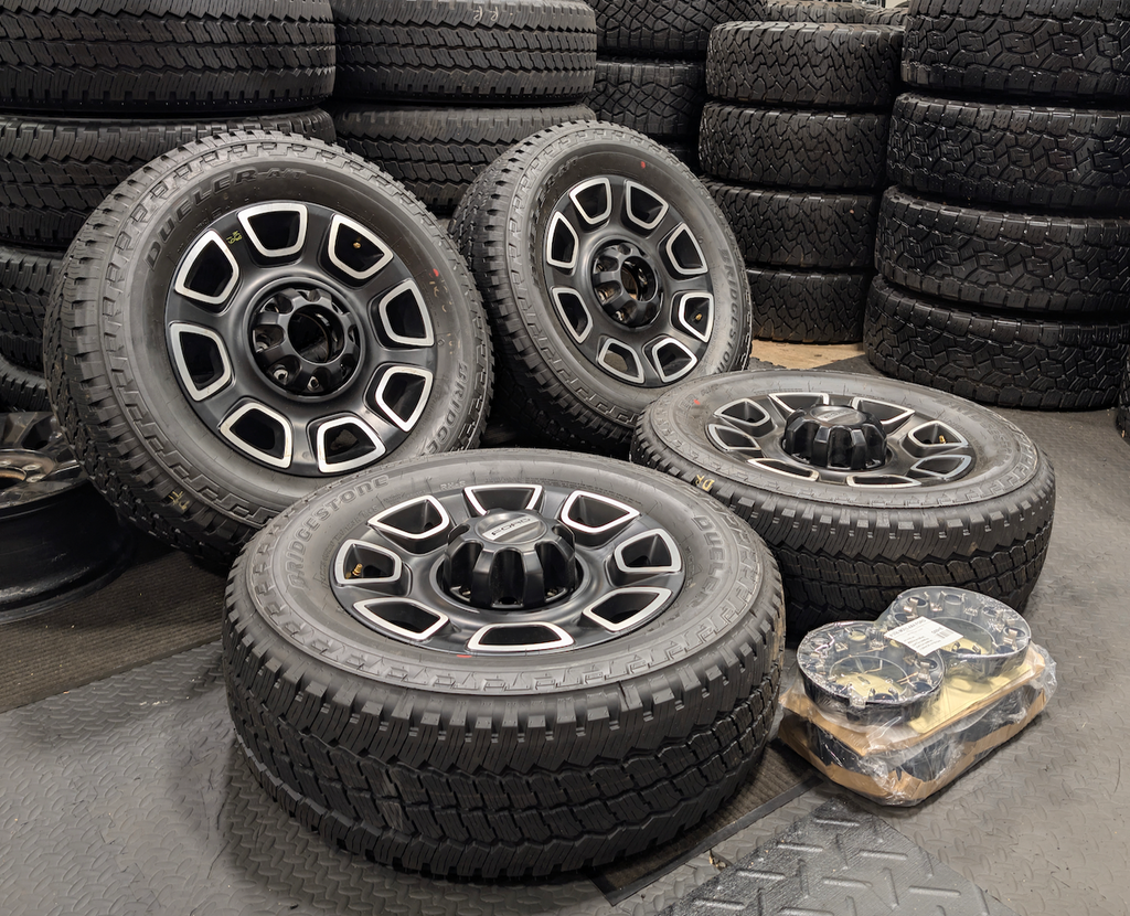 Machined Ford F-250 / F-350 Super Duty Platinum OEM 20” Wrapped in Bridgestone Dueler A/T LT275/65R20