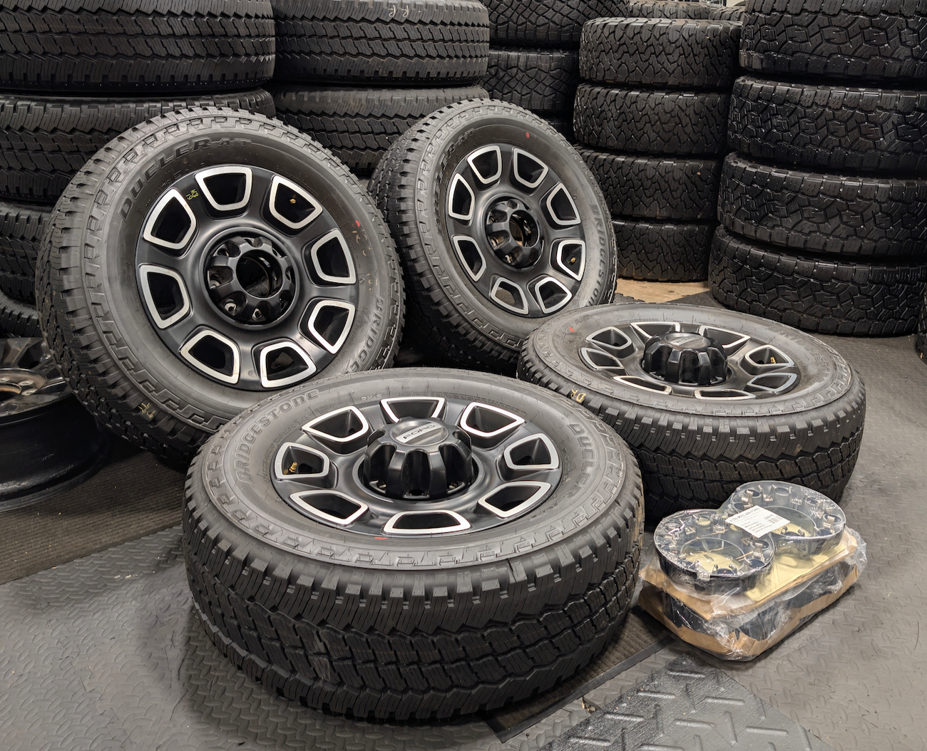 Machined Ford F-250 / F-350 Super Duty Platinum OEM 20” Wrapped in Bridgestone Dueler A/T LT275/65R20