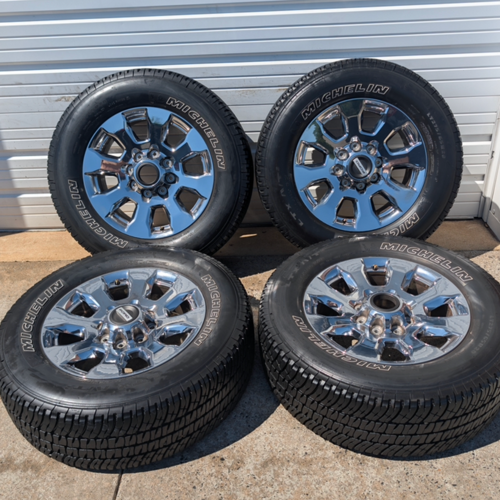 OEM 20” Chrome Ford F-250 King Ranch Wheels wrapped in Michelin LTX A/T2 tires.