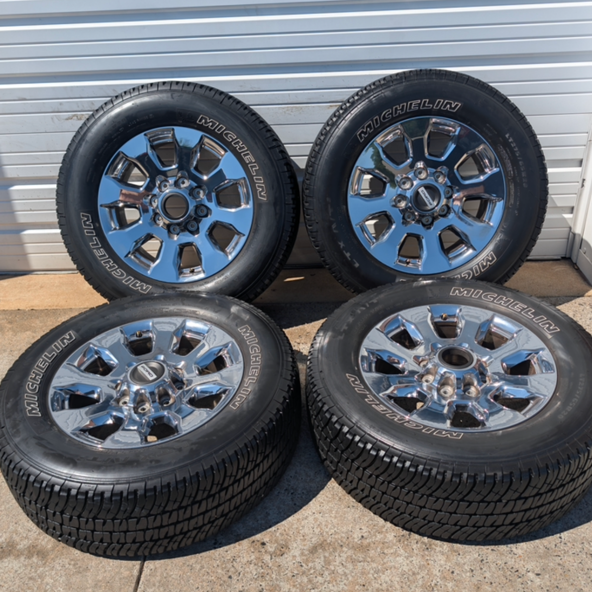 OEM 20” Chrome Ford F-250 King Ranch Wheels wrapped in Michelin LTX A/T2 tires.