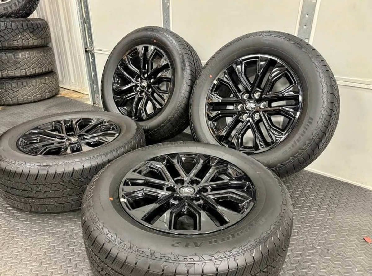 Gloss Black Ford F-150 Lariat OEM 20” Wrapped in Hankook Dynapro AT2 275/60R20