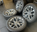 OEM 22” Polished 6-Split-Spoke Wheels wrapped in Bridgestone tires.