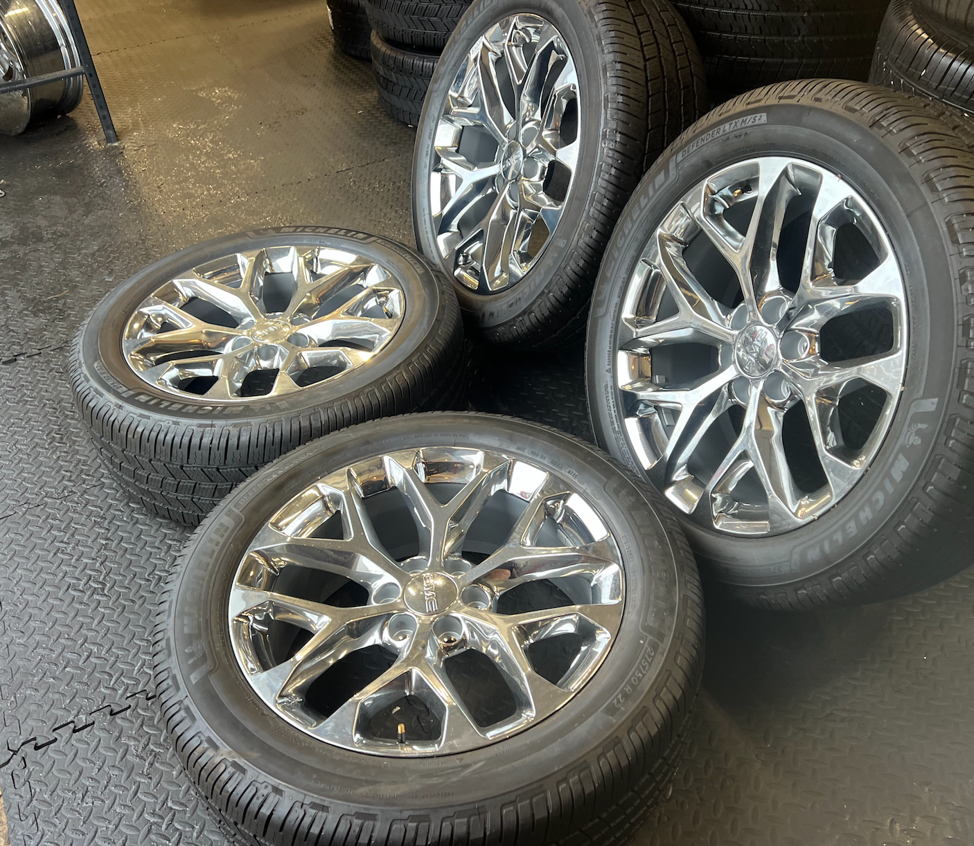 OEM 22” Polished 6-Split-Spoke Wheels wrapped in Bridgestone tires.