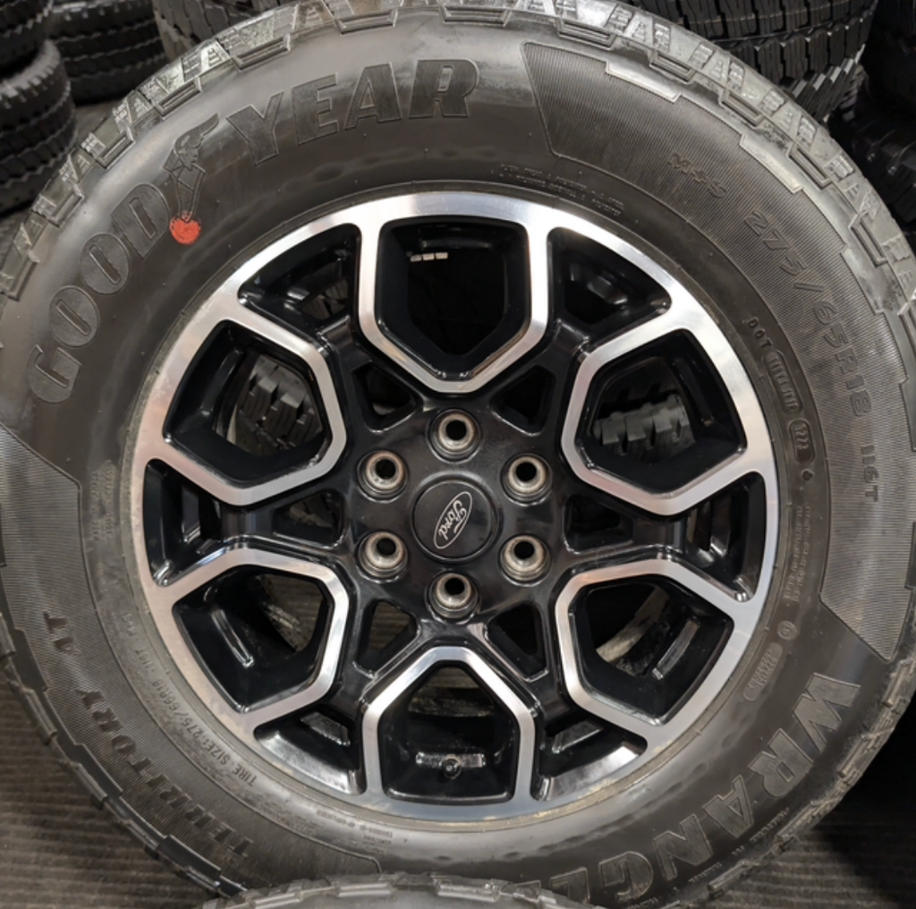 Machined Ford F-150 FX4 Off-Road OEM 18” Wrapped in Goodyear Wrangler Territory A/T 275/65R18