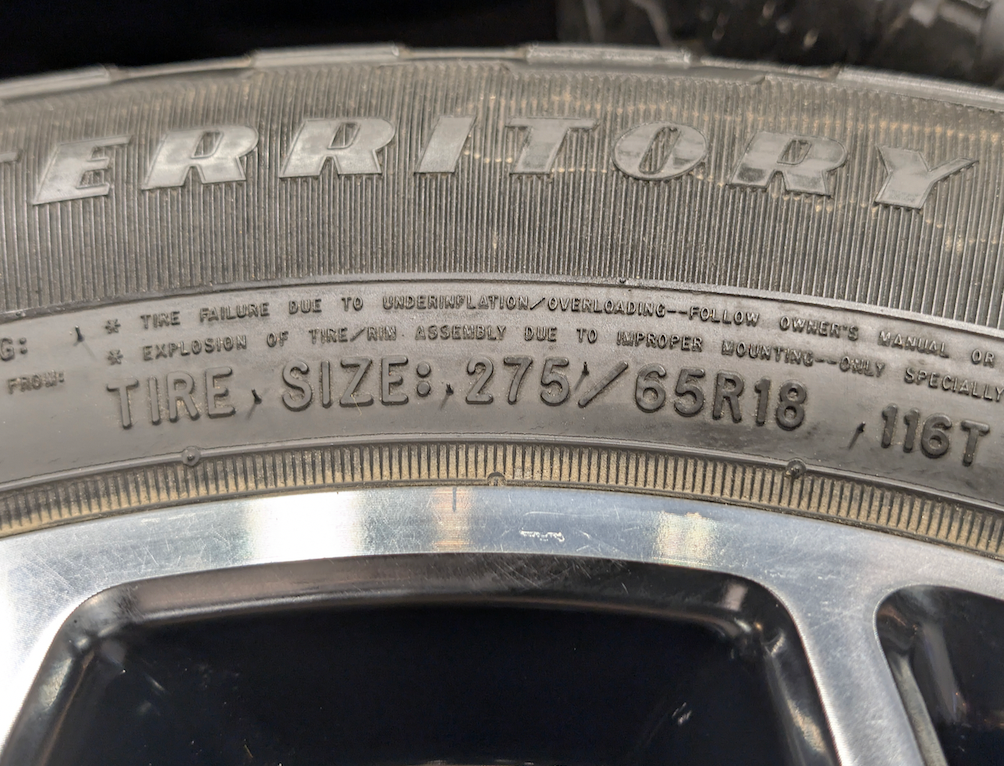 Machined Ford F-150 FX4 Off-Road OEM 18” Wrapped in Goodyear Wrangler Territory A/T 275/65R18