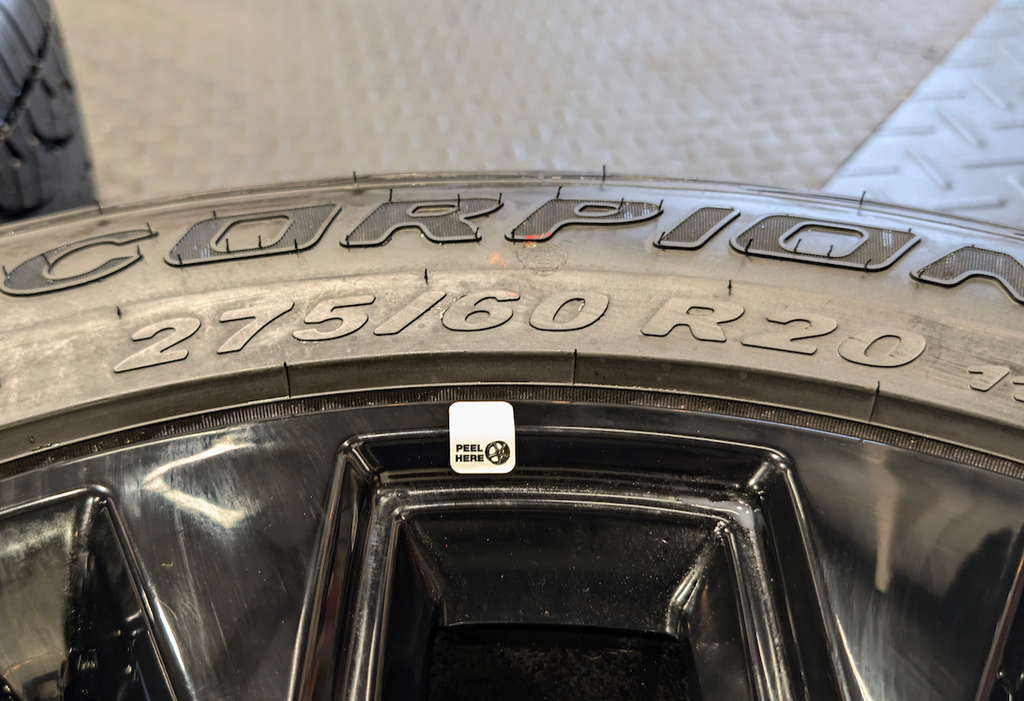 Gloss Black Ford F-150 OEM 20” Wrapped in Pirelli Scorpion ATR 275/60R20