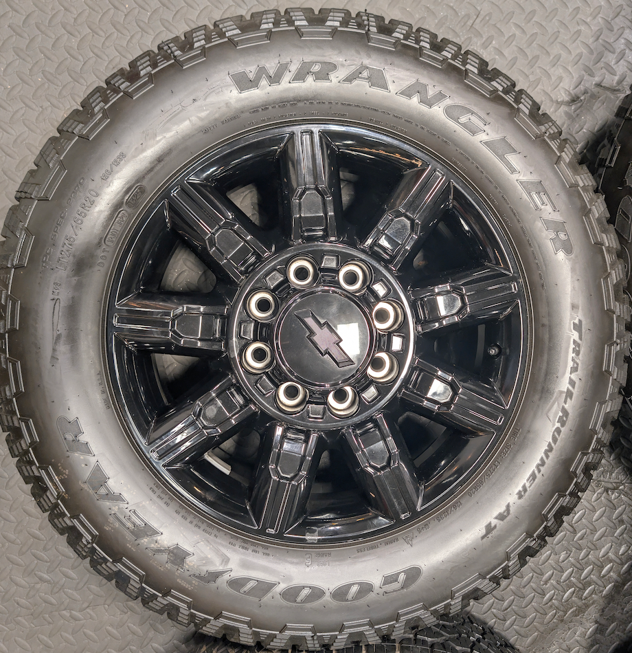 Gloss Black GM 2500HD / 3500HD OEM 20” Wrapped in Goodyear Wrangler TrailRunner A/T LT275/65R20