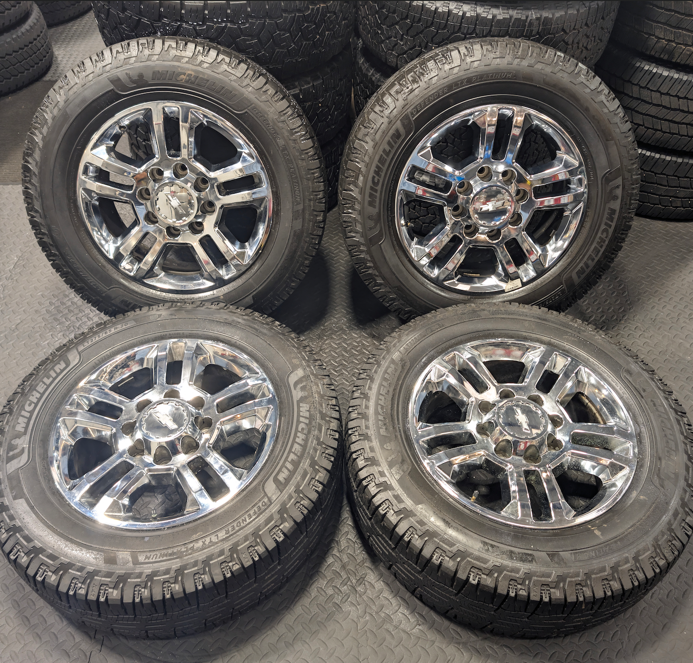 Chrome GM 2500HD / 3500HD OEM 20” Wrapped in Michelin Defender LTX