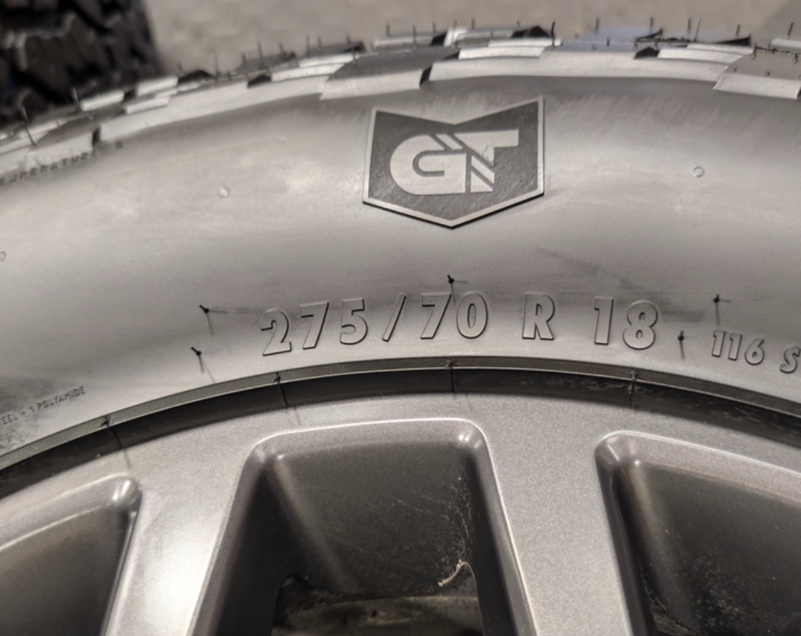 Gray Ford F-150 Tremor OEM 18” Wrapped in General Grabber A/TX 275/70R18