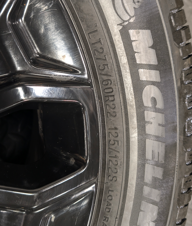Gloss Black GM 2500HD / 3500HD OEM 22” Wrapped in Michelin Defender LTX LT275/60R22