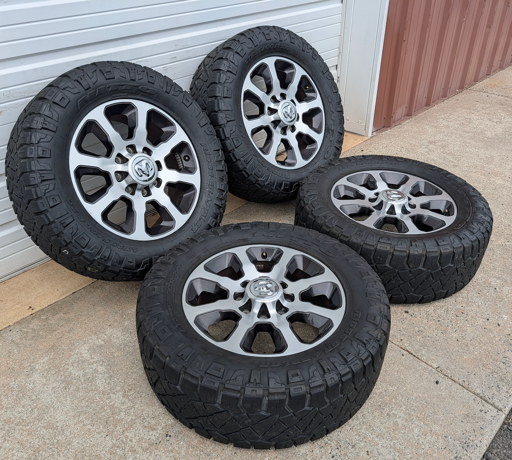 Machined Ram 2500 / 3500 OEM 20” Wrapped in Nitto Ridge Grappler LT295/60R20