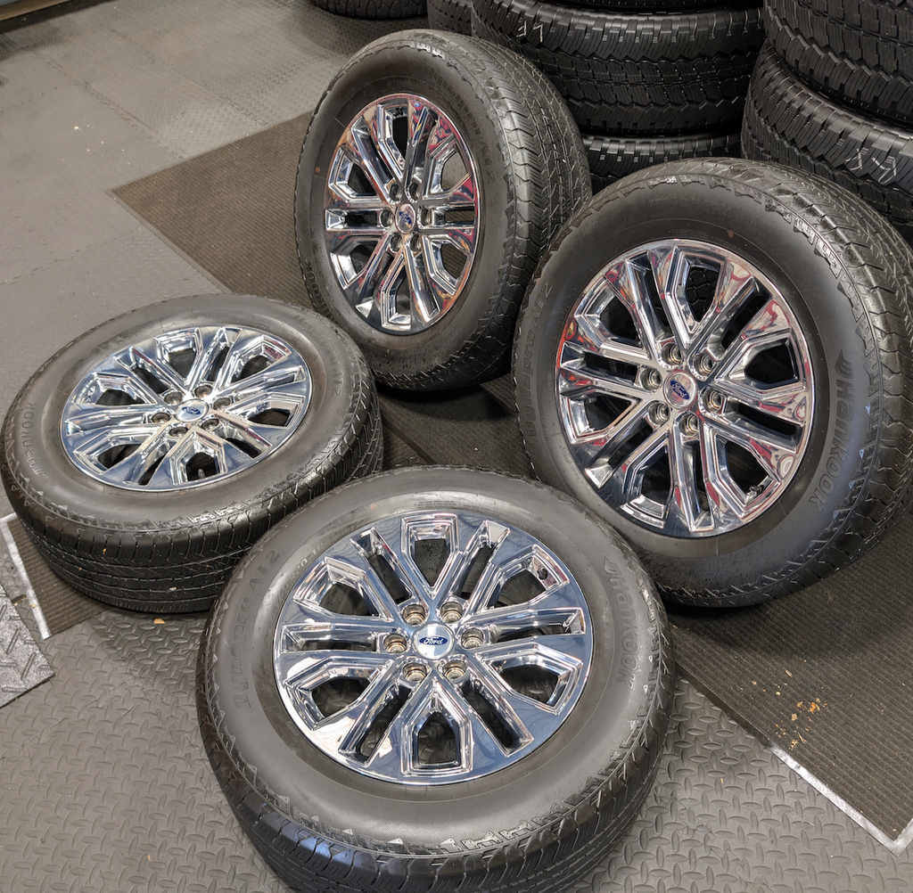 Chrome Ford F-150 OEM 20” Wrapped in Hankook Dynapro AT2 275/60R20