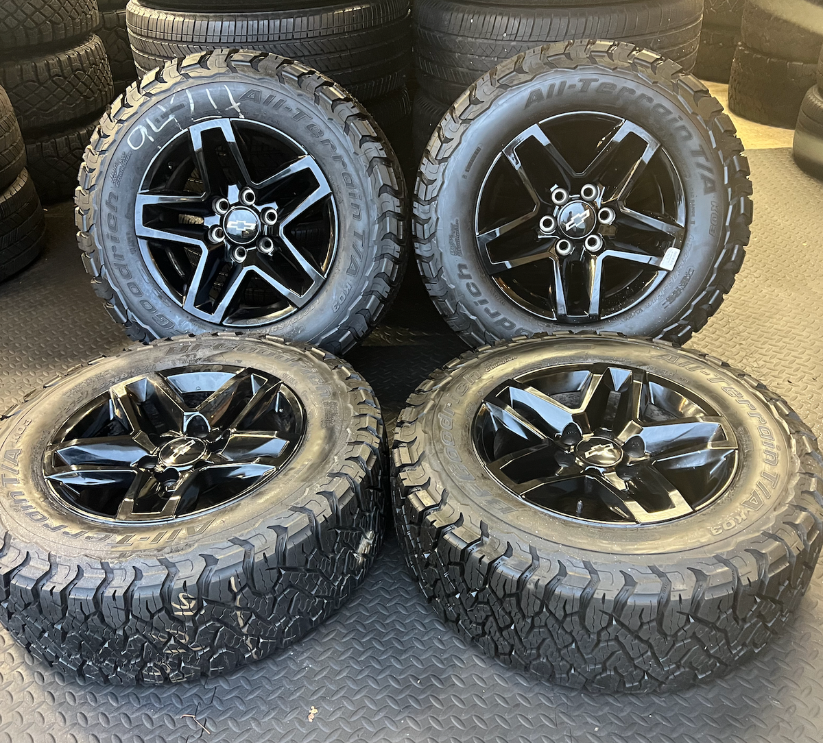Gloss Black Chevrolet Silverado 1500 Trail Boss OEM 18” Wrapped in BFGoodrich All-Terrain T/A 275/65R18
