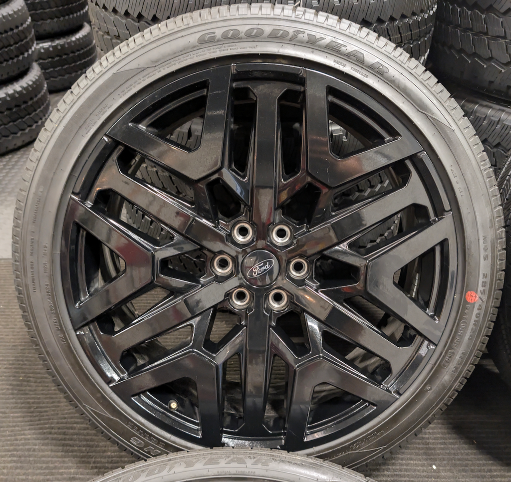 Gloss Black Ford Expedition / F-150 OEM 24” Wrapped in Goodyear Eagle Touring 285/40R24