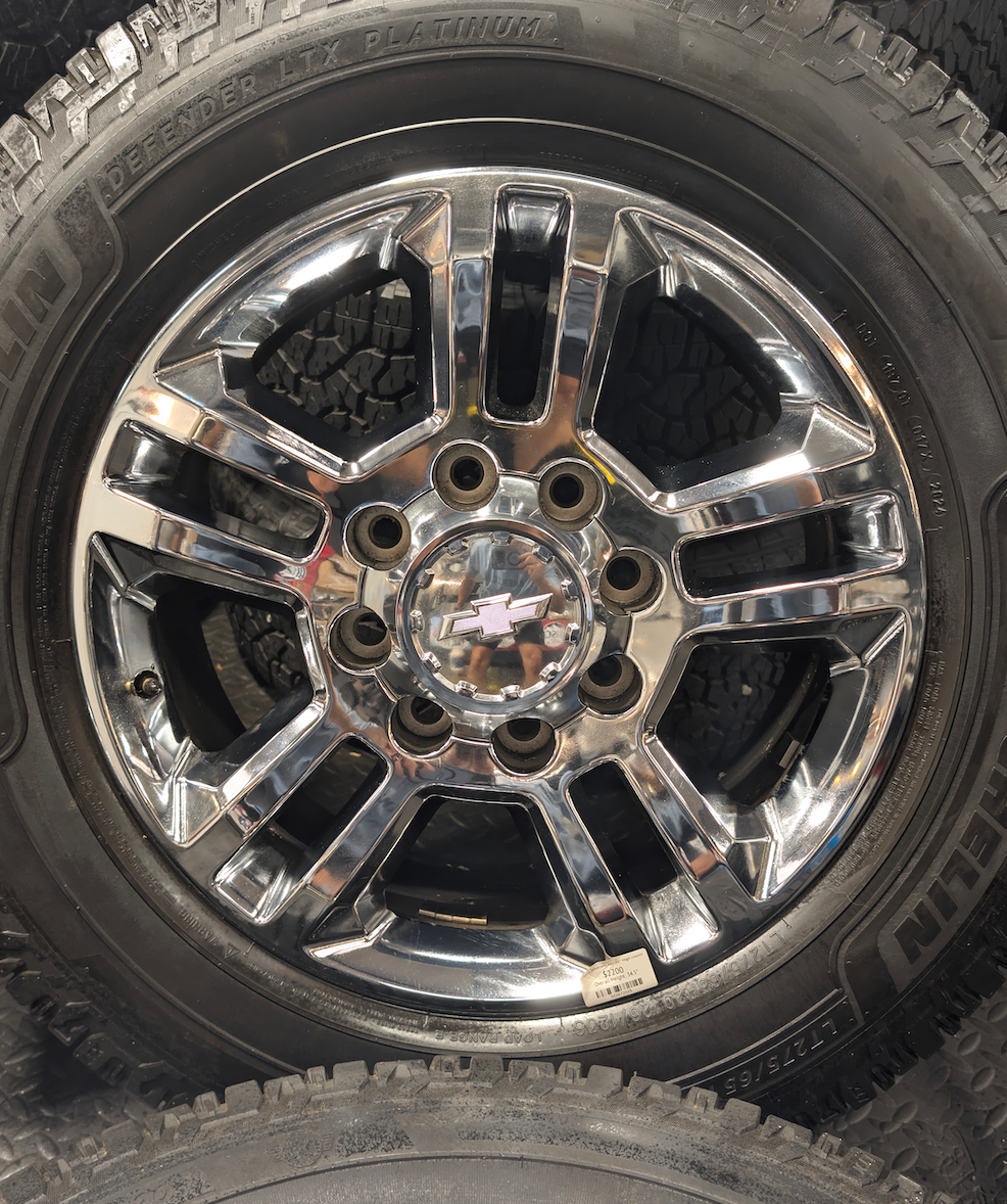 Chrome GM 2500HD / 3500HD OEM 20” Wrapped in Michelin Defender LTX