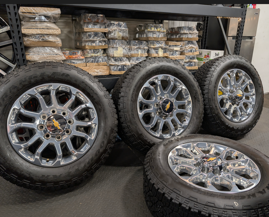 Polished Chevrolet Silverado 2500HD / 3500HD LTZ OEM 20” Wrapped in Goodyear Wrangler TrailRunner A/T LT275/65R20