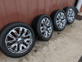 Machined Chevrolet Silverado 1500 High Country OEM 22” Wrapped in Bridgestone Alenza 275/50R22