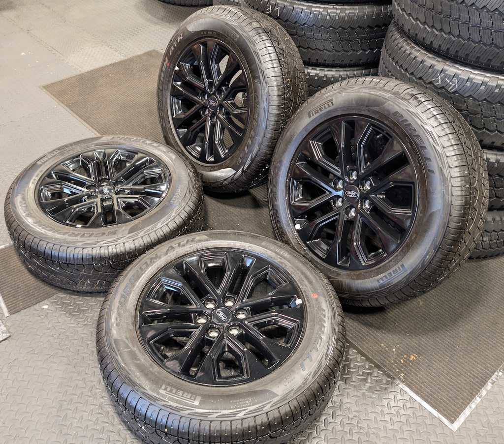 Gloss Black Ford F-150 OEM 20” Wrapped in Pirelli Scorpion ATR 275/60R20