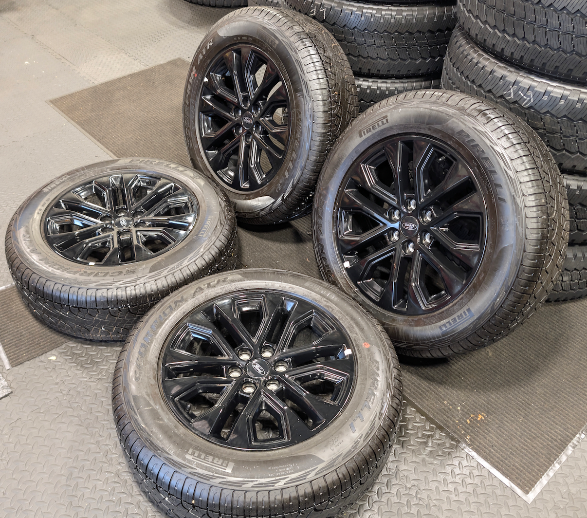 Gloss Black Ford F-150 OEM 20” Wrapped in Pirelli Scorpion ATR 275/60R20