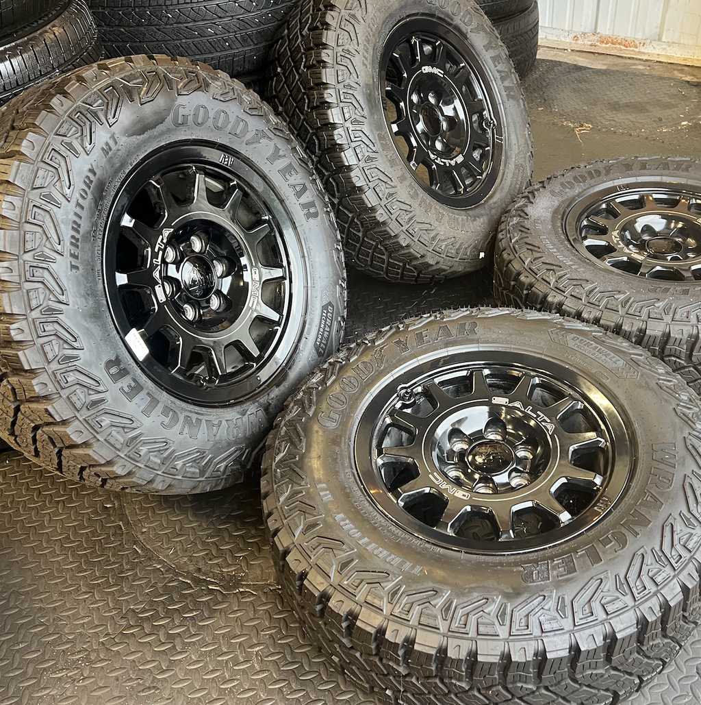 OEM 18” Wheels wrapped in Goodyear Wrangler Territory M/T tires.