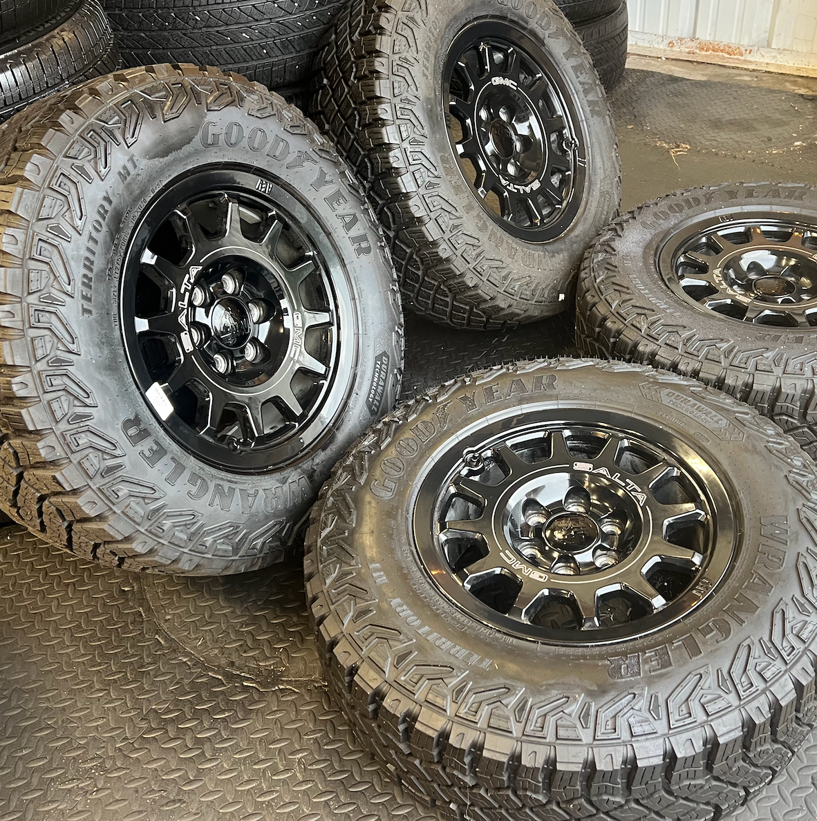 OEM 18” Wheels wrapped in Goodyear Wrangler Territory M/T tires.