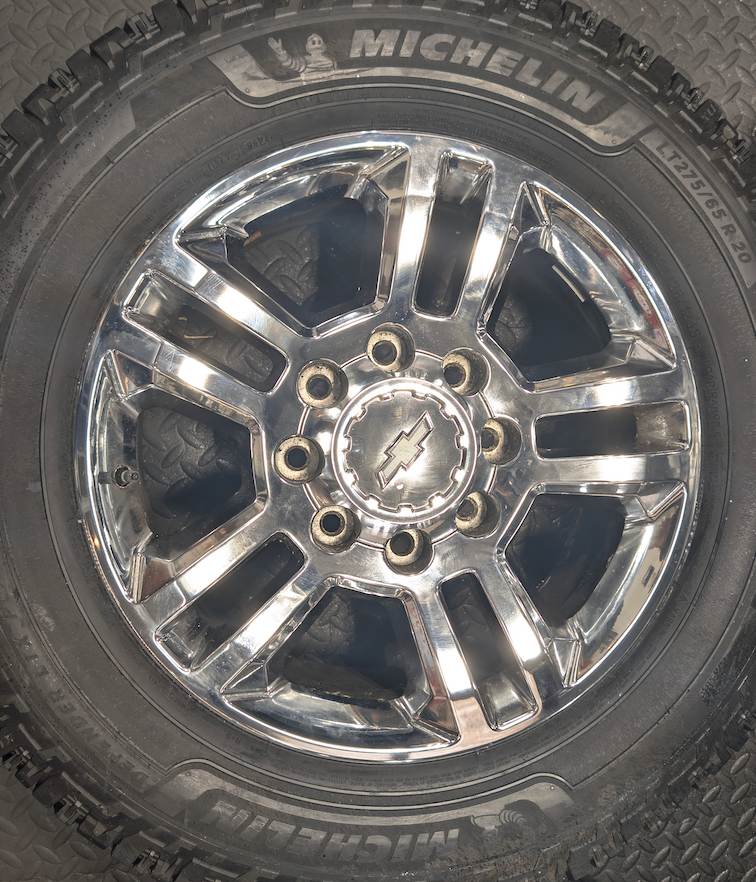 Chrome GM 2500HD / 3500HD OEM 20” Wrapped in Michelin Defender LTX