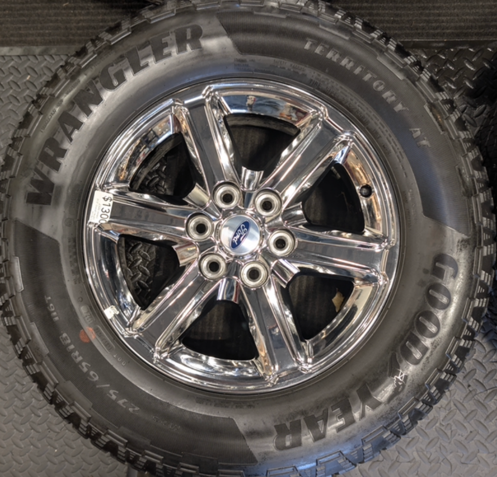 Chrome Ford F-150 OEM 18” Wrapped in Goodyear Wrangler Territory A/T 275/65R18
