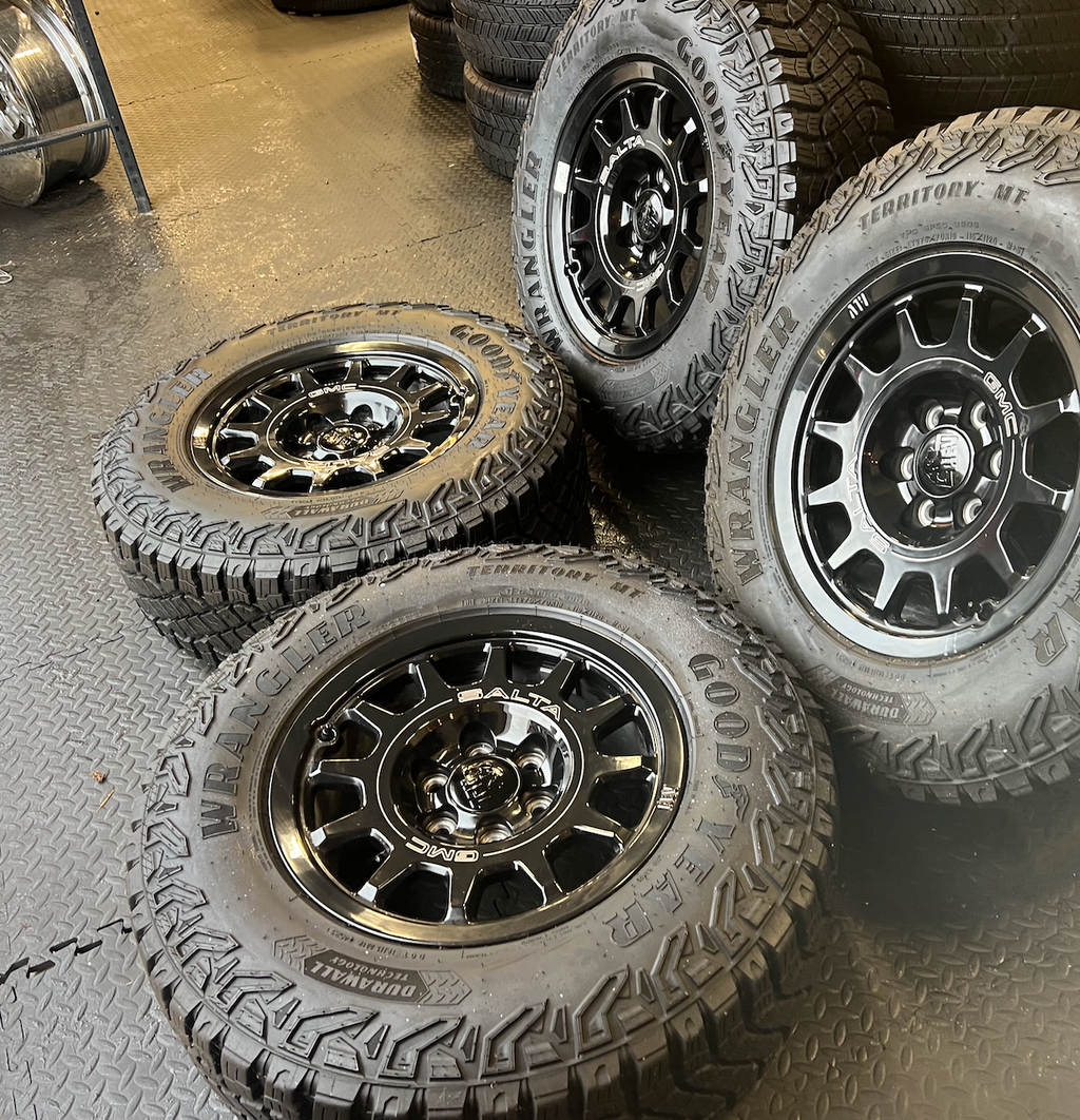 OEM 18” Wheels wrapped in Goodyear Wrangler Territory M/T tires.
