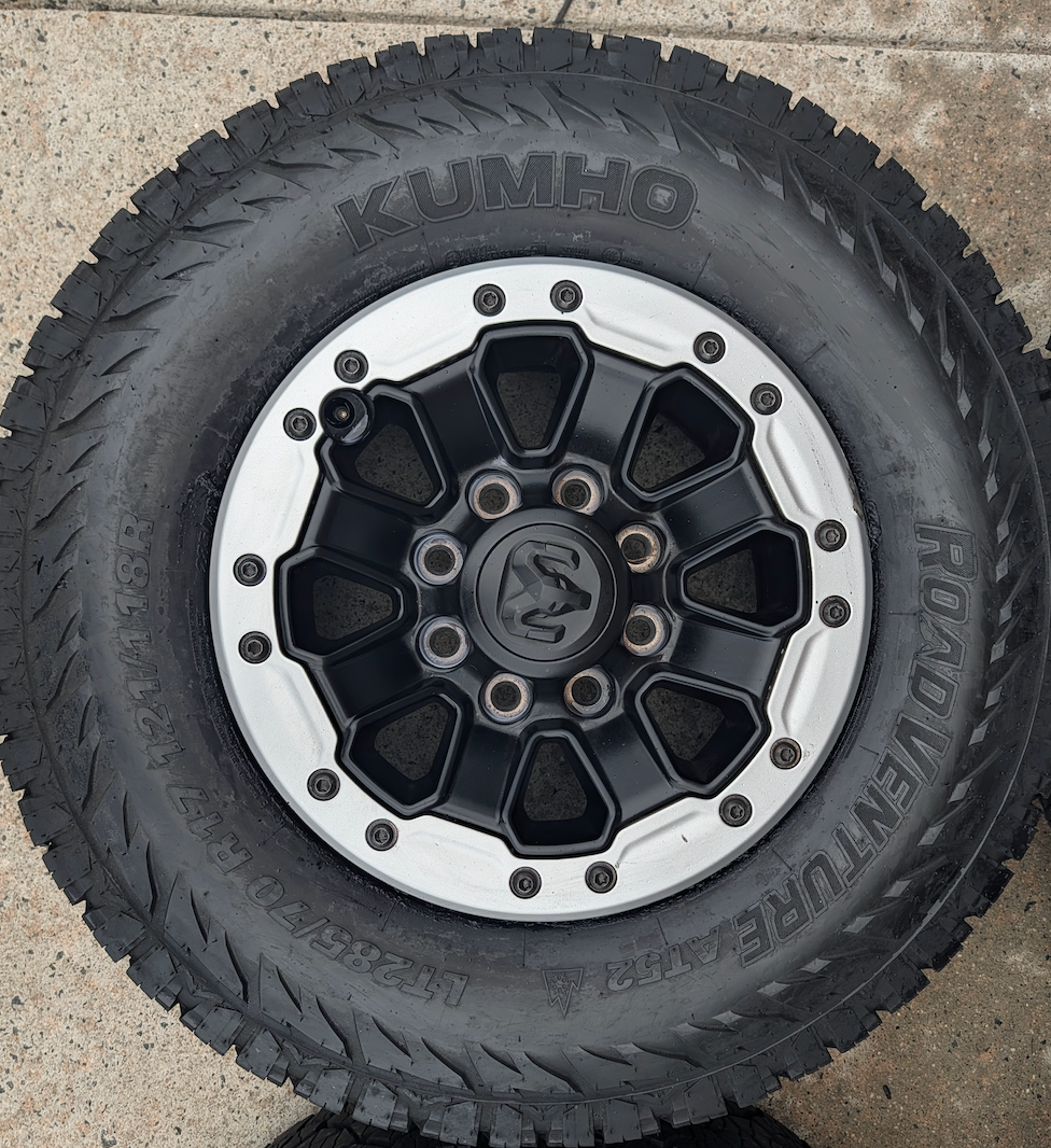 Machined Ram 2500 / 3500 Power Wagon OEM 17” Wrapped in Kumho Road Venture AT52 LT285/70R17