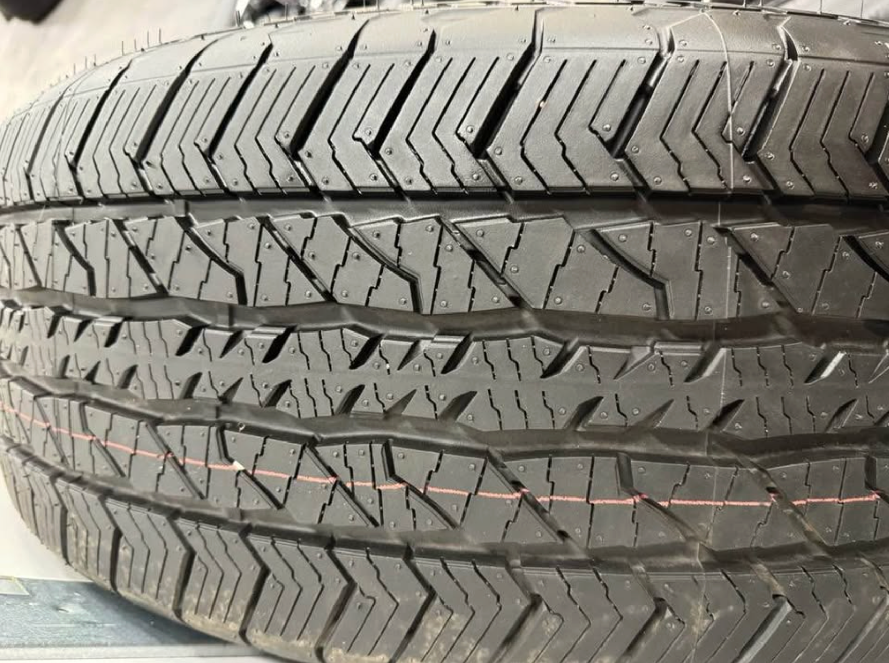 2026 F-150 Lariat black appearance OEM wheels wrapped in 275/60/20 Hankook Dynapro at2 tires