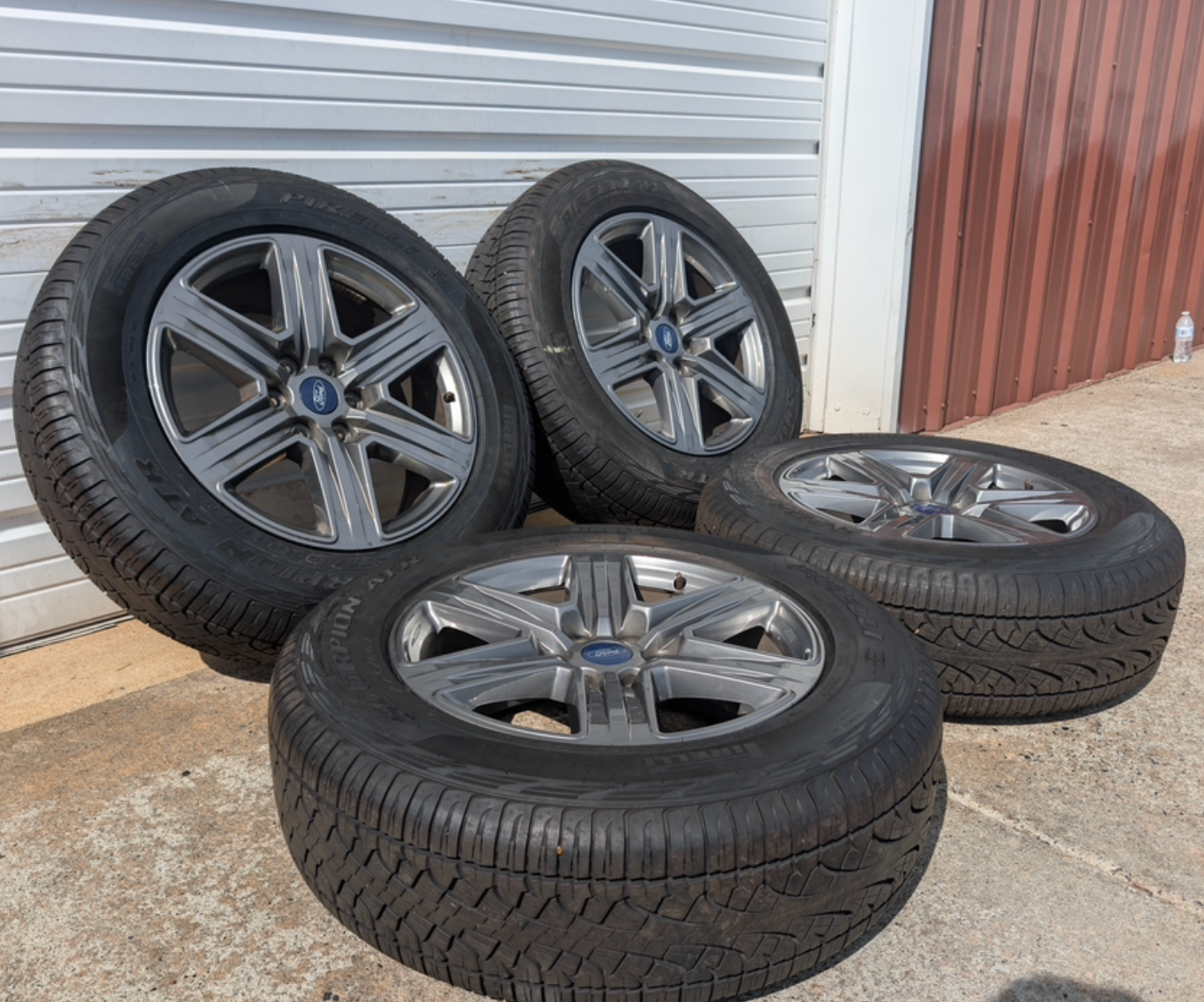 Gray Ford F-150 XLT Sport / Lariat Sport OEM 20” Wrapped in Pirelli Scorpion 275/60R20