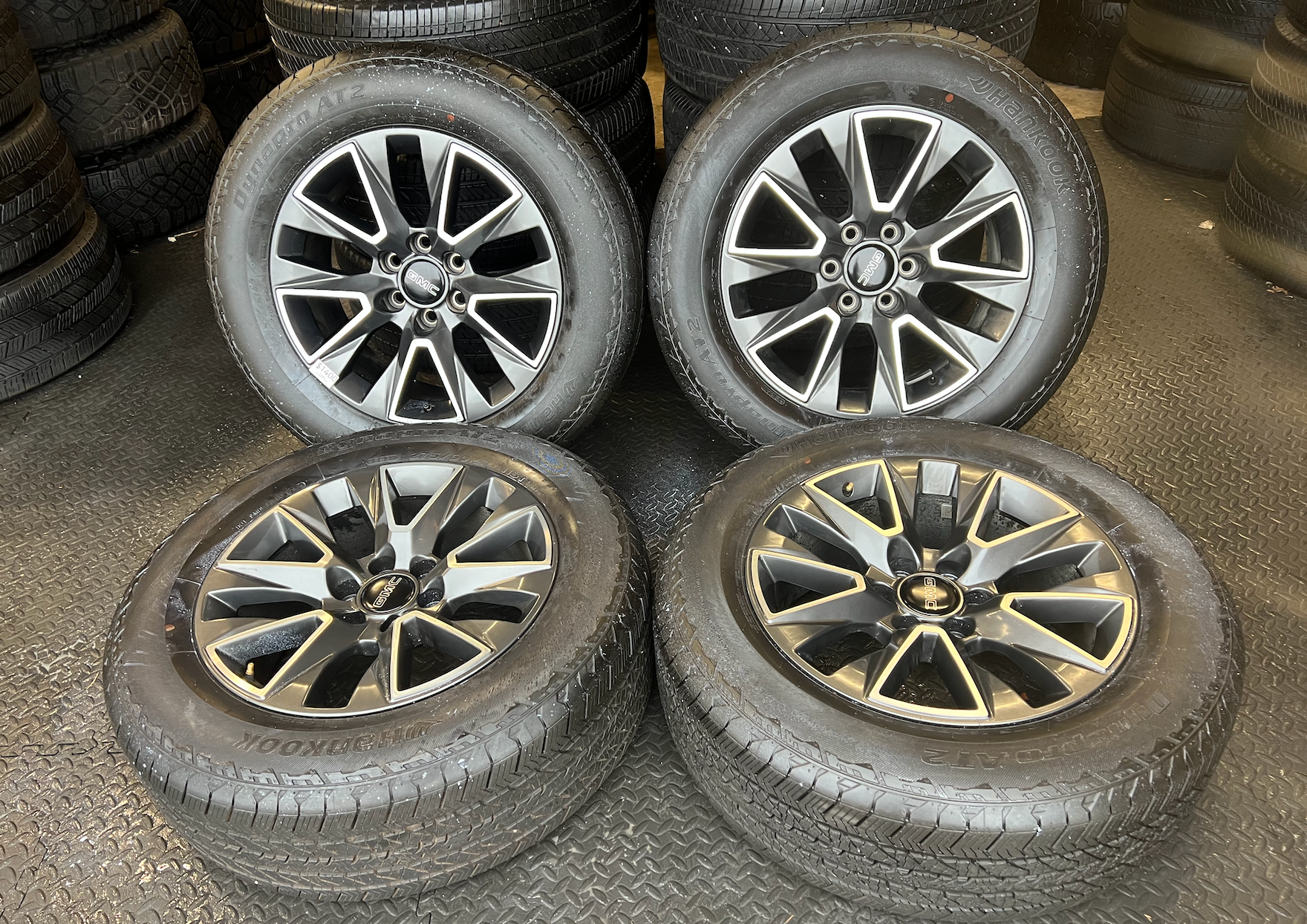 OEM 20” Wheels wrapped in Hankook Dynapro AT2 tires.