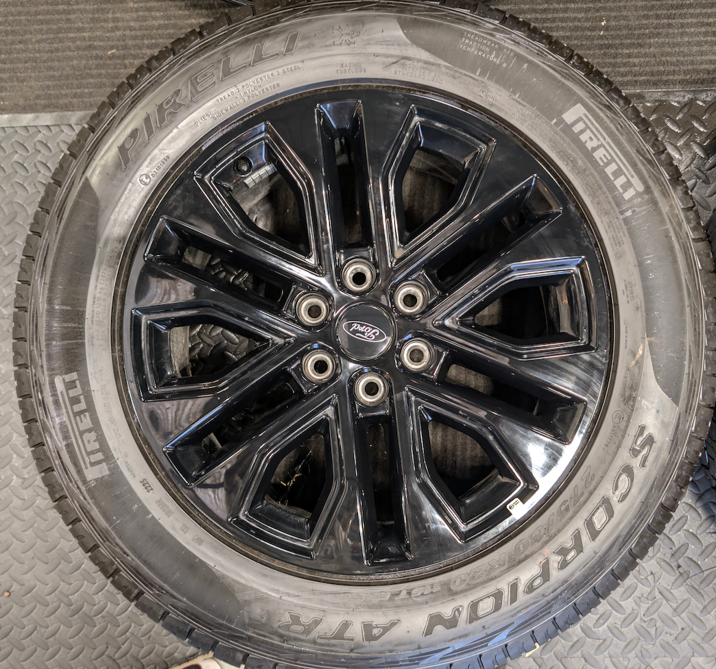 Gloss Black Ford F-150 OEM 20” Wrapped in Pirelli Scorpion ATR 275/60R20