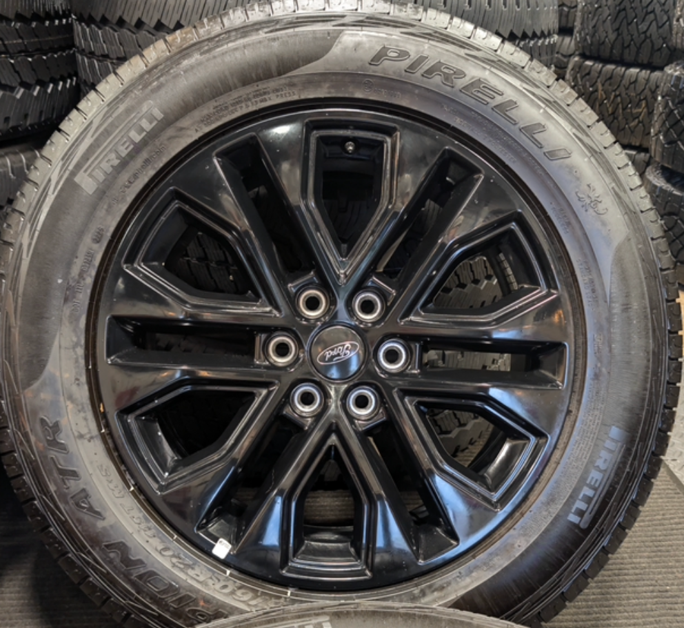 Gloss Black Ford F-150 OEM 20” Wrapped in Pirelli Scorpion ATR 275/60R20