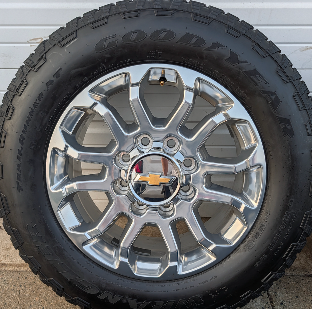 Polished Chevrolet Silverado 2500HD / 3500HD LTZ OEM 20” Wrapped in Goodyear Wrangler TrailRunner A/T LT275/65R20