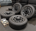 Machined Ford F-250 / F-350 Super Duty Platinum OEM 20” Wrapped in Bridgestone Dueler A/T LT275/65R20