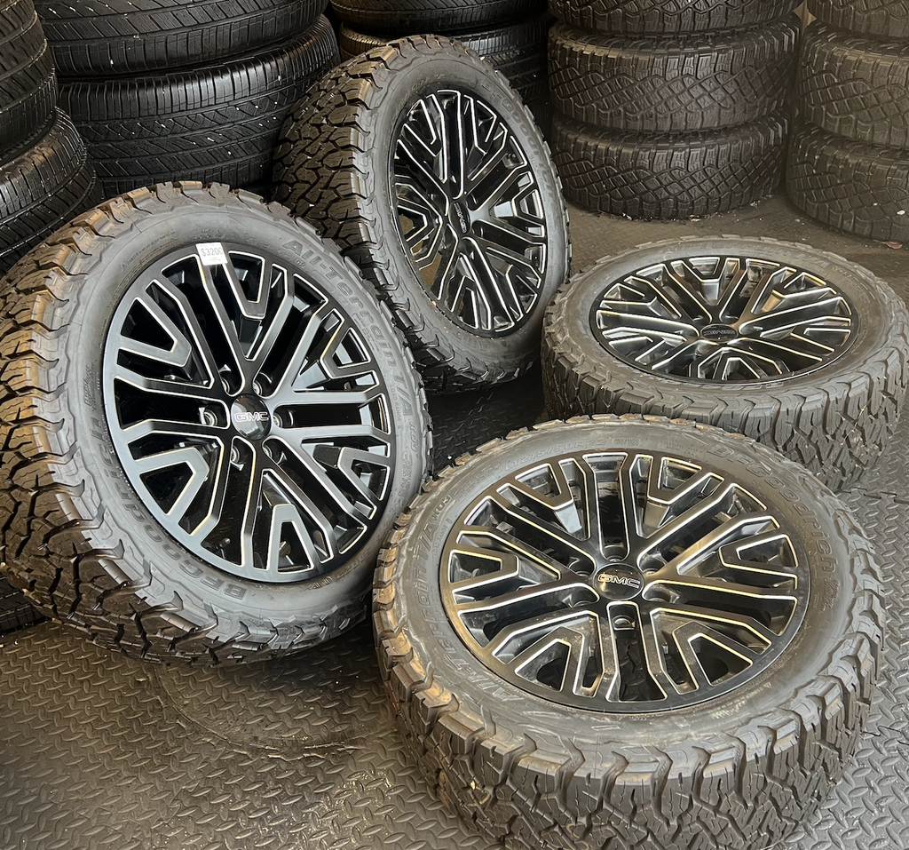 OEM 22”  Wheels wrapped in BFGoodrich All-Terrain T/A tires.