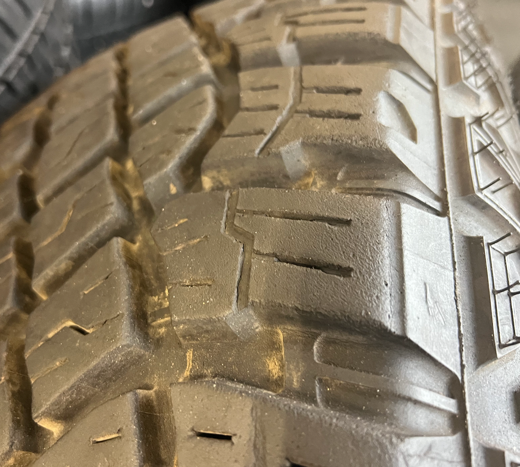 OEM 18” AT4X machined aluminum Wheels wrapped in Goodyear Wrangler Territory M/T tires.