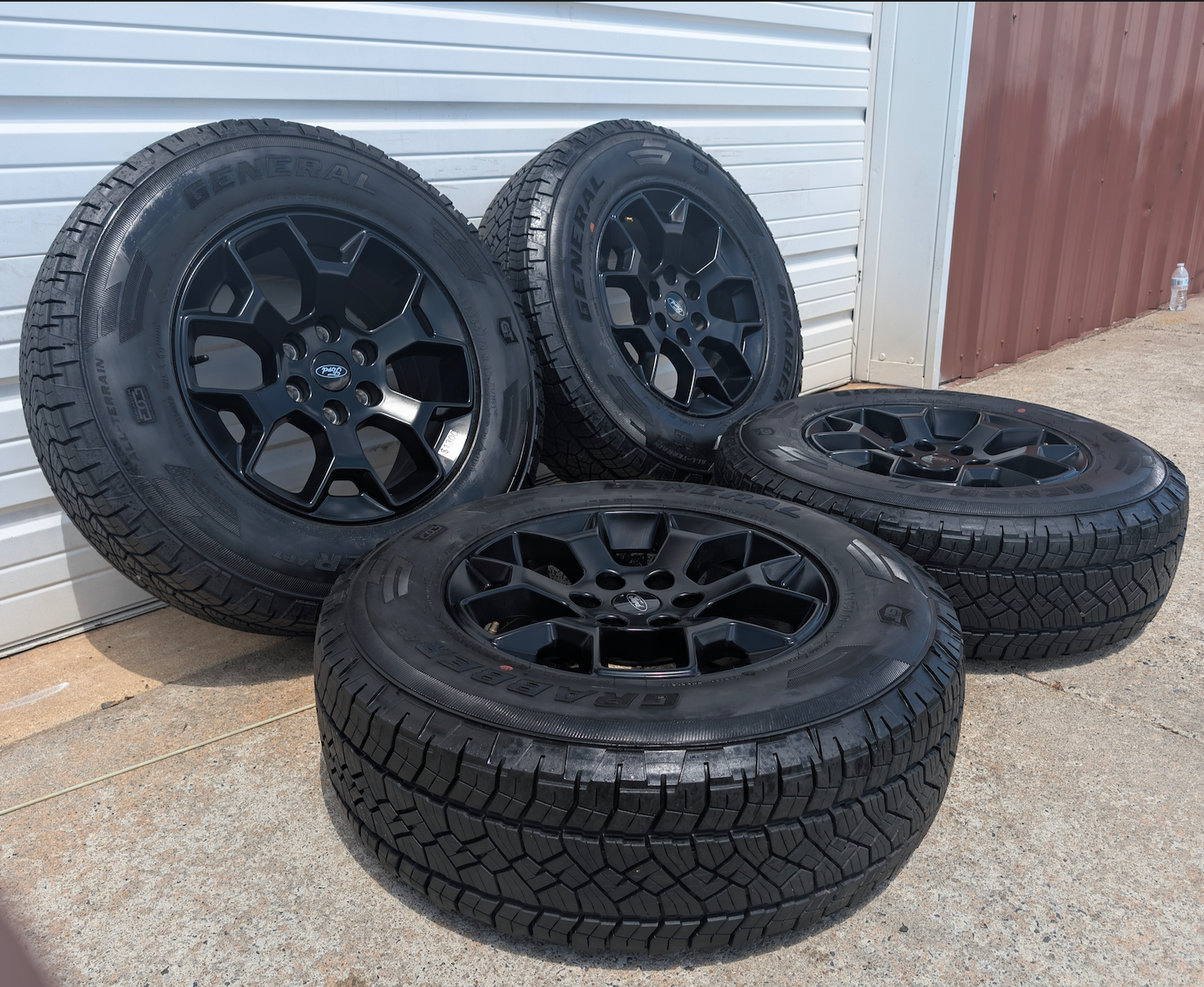 Matte Black Ford F-150 Tremor OEM 18” Wrapped in General Grabber APT LT265/70R18