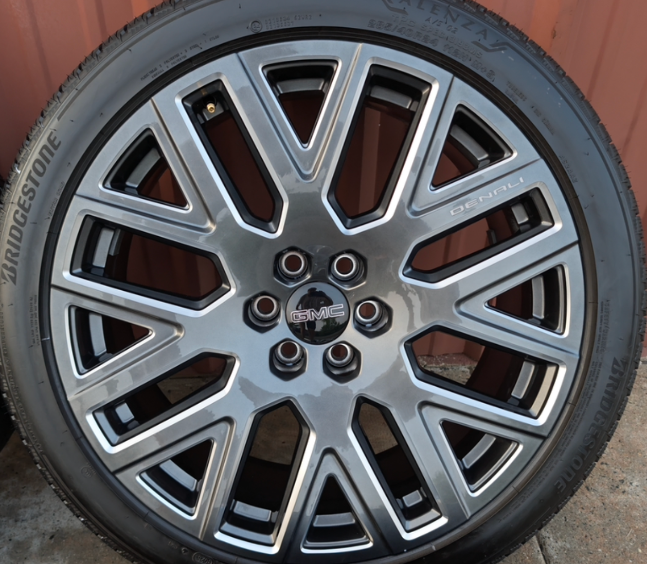 Machined GMC Yukon Denali Ultimate OEM 24” Wrapped in Bridgestone Alenza A/S 02 285/40R24