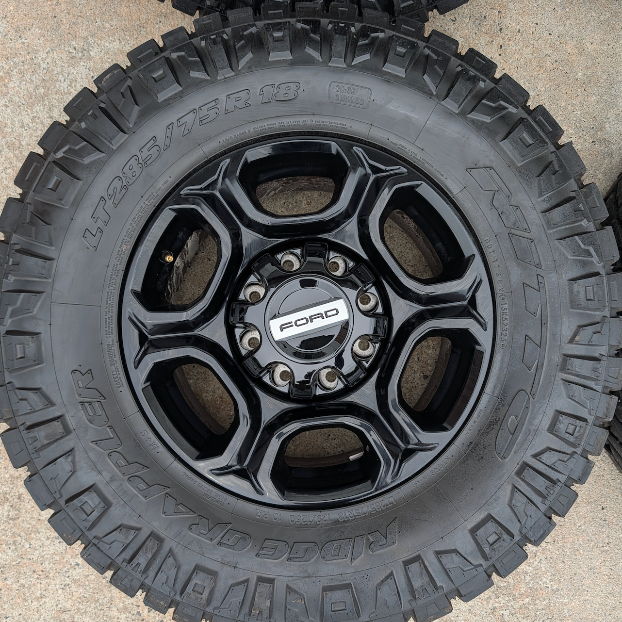 Gloss Black Ford F-250 / F-350 Super Duty OEM 18” Wrapped in Nitto Ridge Grappler LT285/75R18