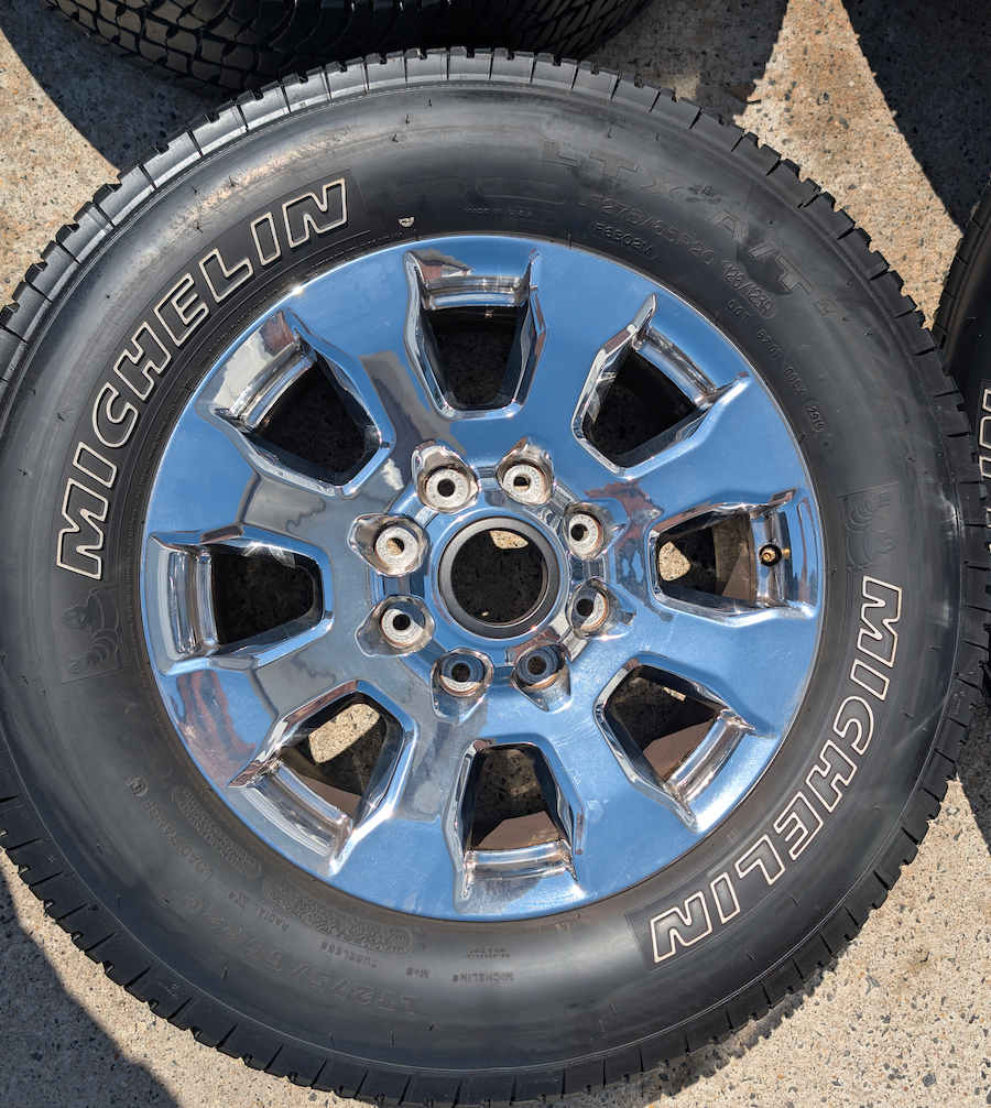 OEM 20” Chrome Ford F-250 King Ranch Wheels wrapped in Michelin LTX A/T2 tires.
